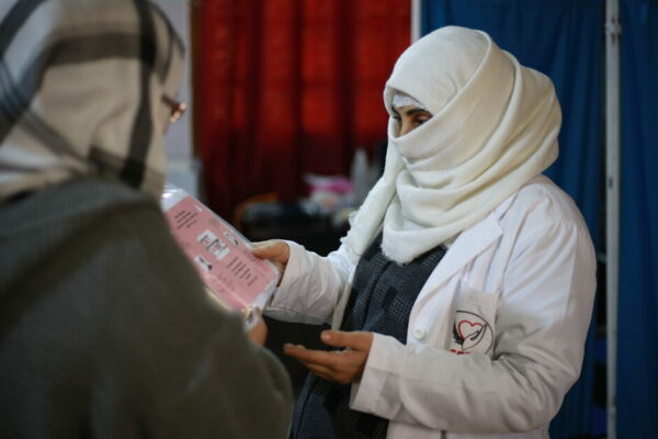 Miada, 30, married with four children, works as a nurse in the reproductive health clinic at Balsam Center operated by the Syria Relief and Development (SRD) in partnership with CARE in northwest Syria. After being displaced three times due to war, Miada lives with her family in a room roofed with insulation sheets inside a camp in northwest Syria. Through her work, Miada supports her family and her husband, who is pursuing higher education in another city. The night of the earthquake Miada was alone with the children and had to run out of the room which its walls were cracked. 

Miada continued her work after the earthquake with courage, overcoming the challenges she went through to help pregnant women who need her presence at the clinic.  

"Women, especially pregnant ones, suffer from increased disruptions after the earthquake, where the threat of losing the fetus has increased. In the gynecology clinic, we have a great responsibility to alleviate their fears and monitor them regularly. Also, there are cases of mothers who can no longer breastfeed due to fear and stress, so we have to educate them about the importance of breastfeeding and staying healthy so they can breastfeed their children again." 

Recently, Miada heard news at work about the reduction of funding and humanitarian aid, and she believes it will negatively impact all aspects of the lives of the residents in northwest Syria, especially since thousands of families rely on humanitarian aid and have no source of income. 

 

About Balsam Center: run by Syria Relief and Development (SRD), a CARE partner in northwest Syria, this center is funded by the Bureau for Humanitarian Assistance (BHA). Balsam Center provides a safe space for women and girls, along with reproductive health services such as pregnancy monitoring, family planning awareness, and general reproductive health education. In addition to referral services and case management, the center offers specialized awareness sessions on child protection, general protection, raising awareness, information dissemination, and health education provided by the mobile team. Additionally, the center provides various other services focused on life skills. 

Through BHA funding, CARE and its partners in northwest Syria responded to the earthquake-affected areas by clearing debris and providing cash assistance to the most vulnerable families to secure food, water, sanitation, and protection services for earthquake survivors. This is in addition to their ongoing and comprehensive services aimed at promoting food security in northwest Syria. This includes monthly cash vouchers, support for livelihoods, agricultural infrastructure development, and the rehabilitation of water and sanitation networks in the region with a total of 2.5 million people reached with these services between July 2022 and October 2023. 