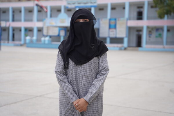 Dunia, a mother of three, is a teacher in one of Yemen's schools. Her school was close to the front lines and was destroyed in the fighting.  Dunia and her colleagues, including Ashwaq Abduljalil, worked hard to relocate the students from their damaged school to another nearby school to study in the afternoons so they wouldn't miss out on an education.

“Reassuring and comforting young girls in class with the sound of shelling and gunfire going on while I was shaking inside was the hardest thing to do, especially at the beginning of the conflict on the front lines of the city,” she says.